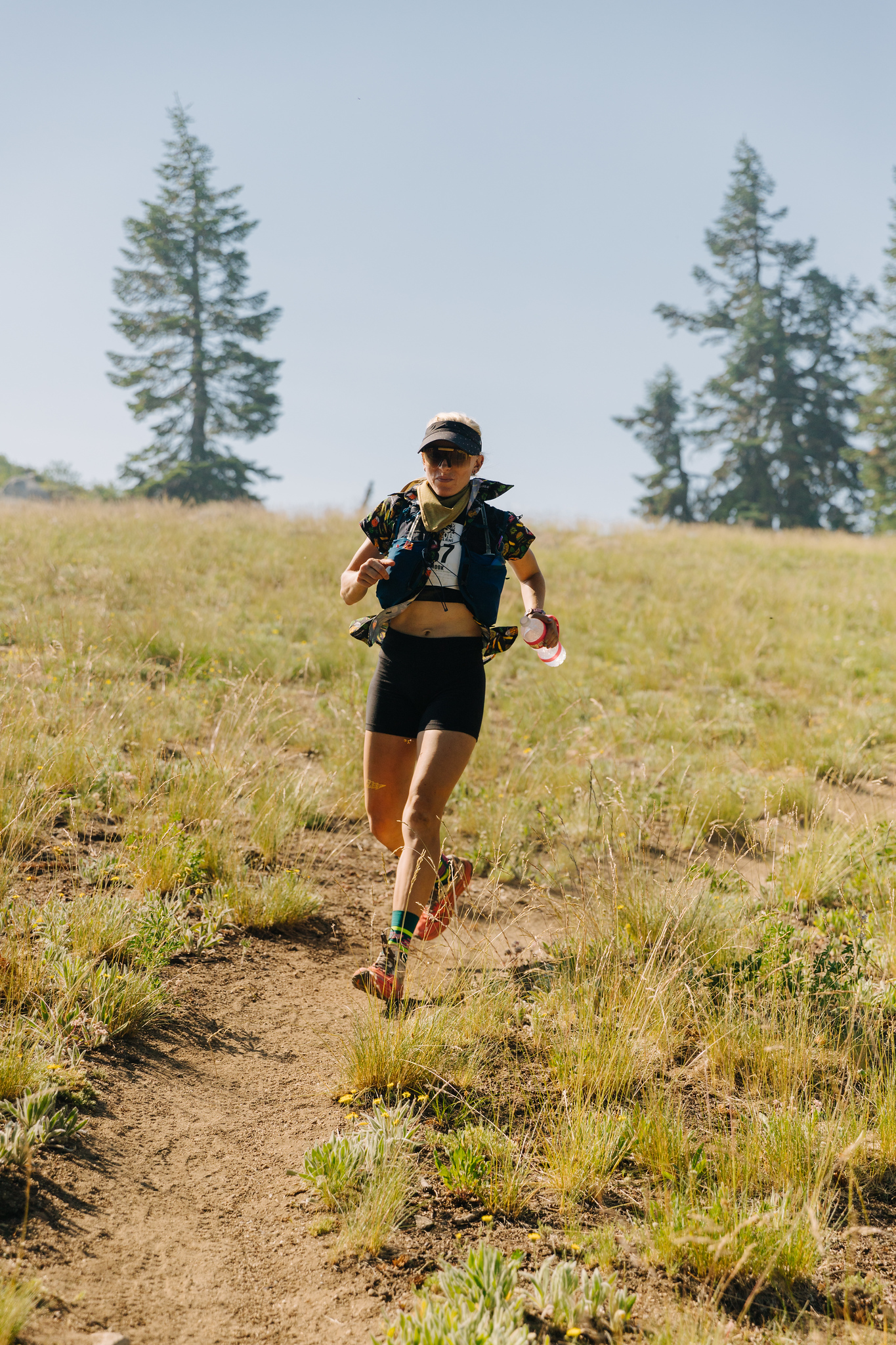 Larissa running down the trails