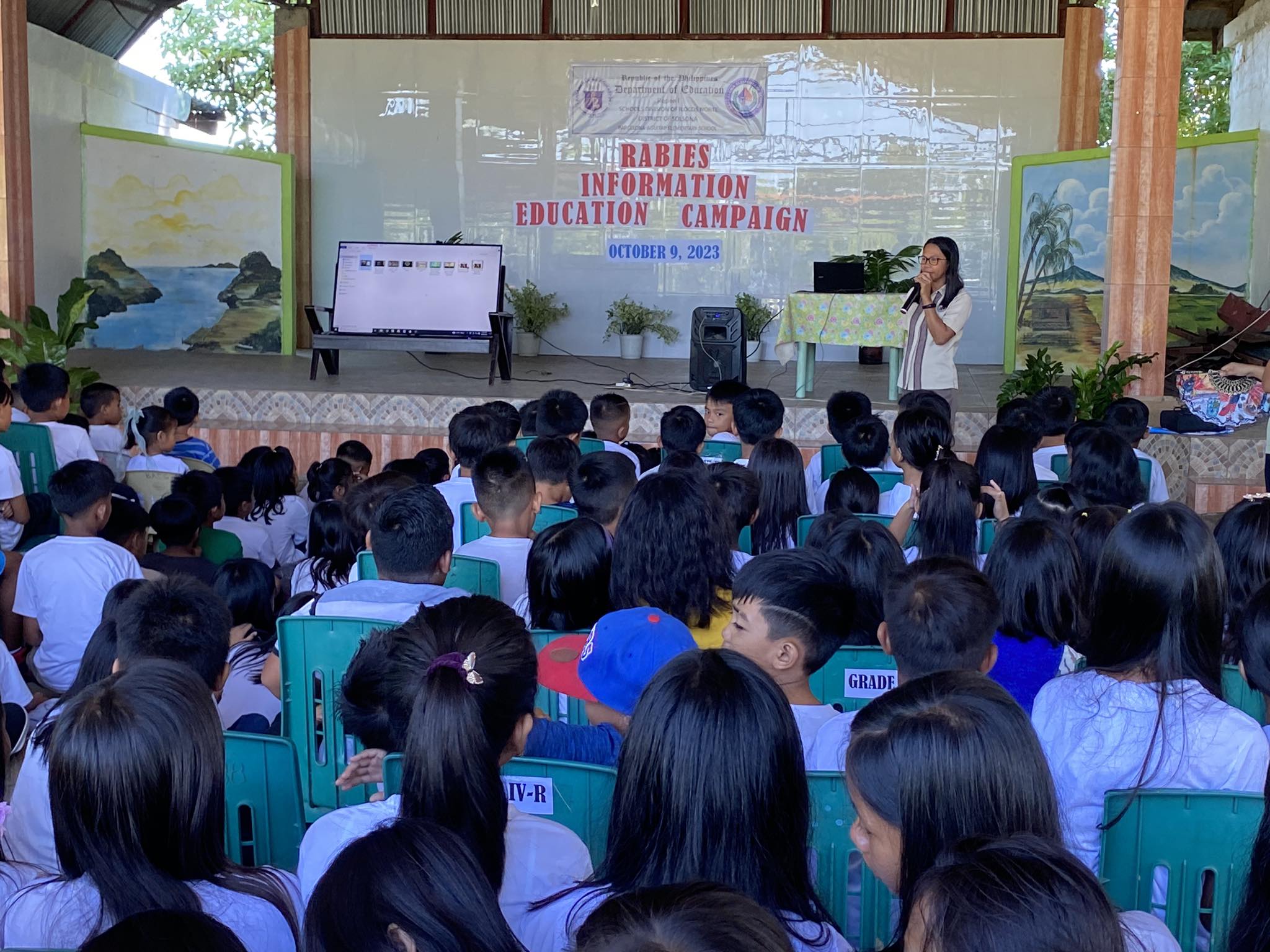 Liza conducts rabies awareness campaign among students.