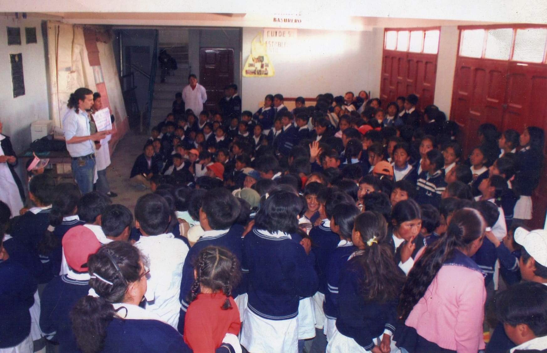 Julian teaches some school children about rabies.